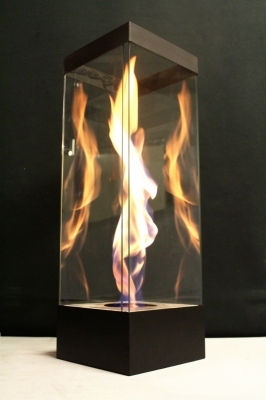 Large portable fire feature in glass swirl flame