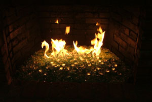 fire rocks in a brick fireplace