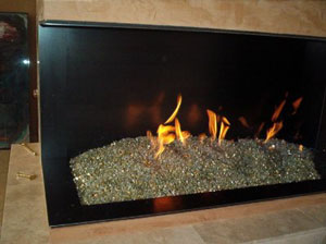 corner fireplace with fire rocks